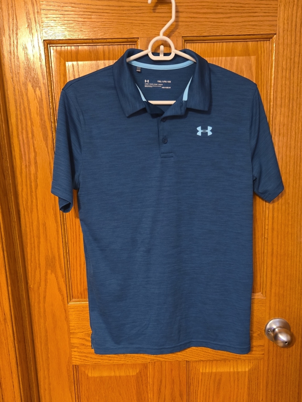 Under Armour Kid’s Dark Green Polo with Light Blue Logo